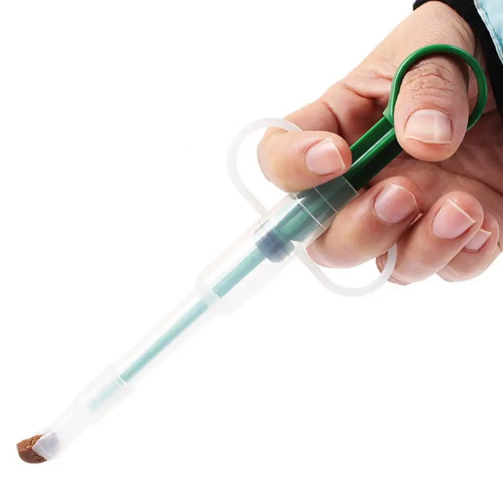 Dispozitiv pentru administrarea pastilelor și medicamentelor la câini și pisici – Injector pentru pastile și seringă de alimentare.