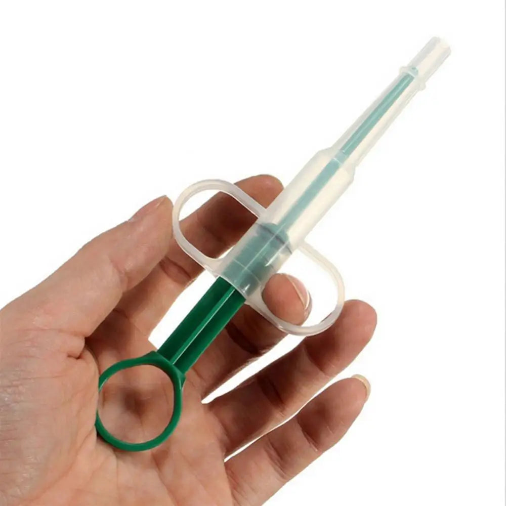 Dispozitiv pentru administrarea pastilelor și medicamentelor la câini și pisici – Injector pentru pastile și seringă de alimentare.